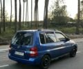 Синий Мазда Демио, объемом двигателя 1.5 л и пробегом 224 тыс. км за 2200 $, фото 2 на Automoto.ua