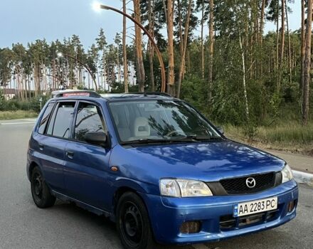 Синий Мазда Демио, объемом двигателя 1.5 л и пробегом 224 тыс. км за 2200 $, фото 3 на Automoto.ua
