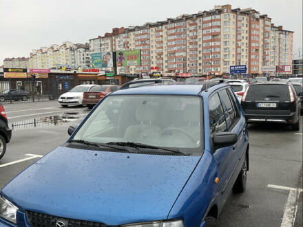 Синий Мазда Демио, объемом двигателя 1.32 л и пробегом 330 тыс. км за 2100 $, фото 1 на Automoto.ua