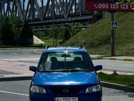 Синій Мазда Деміо, об'ємом двигуна 1.5 л та пробігом 195 тис. км за 2300 $, фото 1 на Automoto.ua