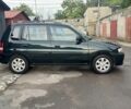 Зеленый Мазда Демио, объемом двигателя 1.3 л и пробегом 205 тыс. км за 2600 $, фото 4 на Automoto.ua