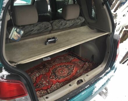 Зеленый Мазда Демио, объемом двигателя 1.3 л и пробегом 180 тыс. км за 1000 $, фото 11 на Automoto.ua