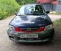 Зеленый Мазда Демио, объемом двигателя 1.5 л и пробегом 171 тыс. км за 1390 $, фото 3 на Automoto.ua