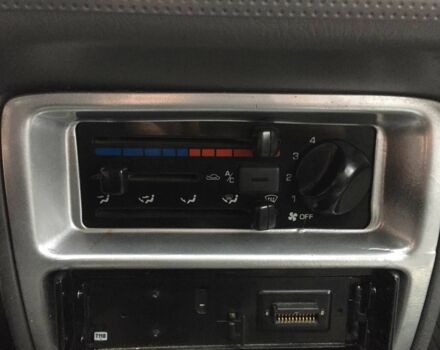 Зеленый Мазда Демио, объемом двигателя 1.3 л и пробегом 180 тыс. км за 1000 $, фото 12 на Automoto.ua