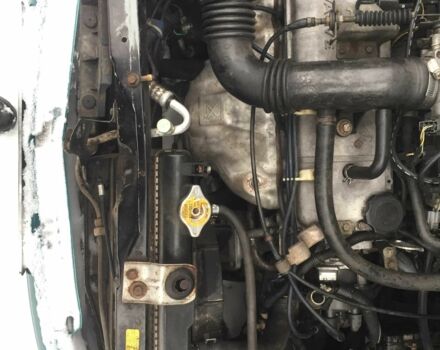 Зеленый Мазда Демио, объемом двигателя 1.3 л и пробегом 180 тыс. км за 1000 $, фото 3 на Automoto.ua