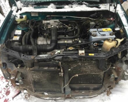 Зеленый Мазда Демио, объемом двигателя 1.3 л и пробегом 180 тыс. км за 1000 $, фото 4 на Automoto.ua