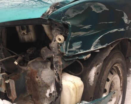 Зеленый Мазда Демио, объемом двигателя 1.3 л и пробегом 180 тыс. км за 1000 $, фото 1 на Automoto.ua