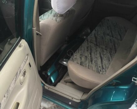 Зеленый Мазда Демио, объемом двигателя 1.3 л и пробегом 180 тыс. км за 1000 $, фото 9 на Automoto.ua