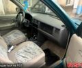 Зеленый Мазда Демио, объемом двигателя 1.3 л и пробегом 250 тыс. км за 1450 $, фото 6 на Automoto.ua