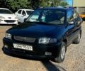 Зелений Мазда Деміо, об'ємом двигуна 1.3 л та пробігом 155 тис. км за 1999 $, фото 1 на Automoto.ua
