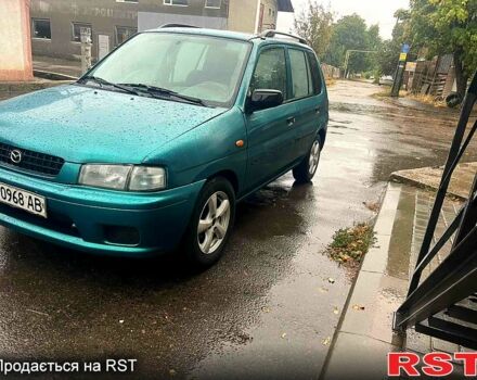 Зеленый Мазда Демио, объемом двигателя 1.3 л и пробегом 250 тыс. км за 1450 $, фото 1 на Automoto.ua
