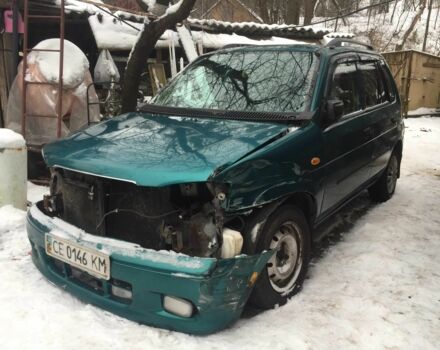 Зелений Мазда Деміо, об'ємом двигуна 1.3 л та пробігом 180 тис. км за 1000 $, фото 1 на Automoto.ua