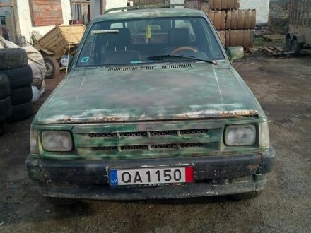 Зелений Мазда E 2000, об'ємом двигуна 2 л та пробігом 467 тис. км за 1183 $, фото 1 на Automoto.ua