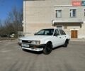 Белый Мазда Фамилия, объемом двигателя 1.3 л и пробегом 324 тыс. км за 1100 $, фото 1 на Automoto.ua