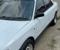 Белый Мазда Фамилия, объемом двигателя 1.5 л и пробегом 600 тыс. км за 700 $, фото 1 на Automoto.ua
