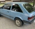 Синий Мазда Фамилия, объемом двигателя 1.3 л и пробегом 137 тыс. км за 846 $, фото 5 на Automoto.ua