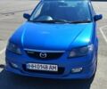 Синий Мазда Фамилия, объемом двигателя 1.99 л и пробегом 185 тыс. км за 4000 $, фото 1 на Automoto.ua