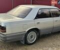 Мазда Люси, объемом двигателя 2 л и пробегом 300 тыс. км за 700 $, фото 2 на Automoto.ua