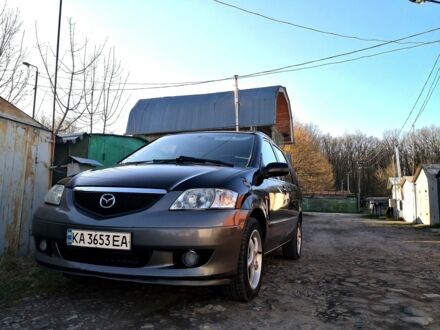 Черный Мазда МПВ, объемом двигателя 2 л и пробегом 215 тыс. км за 3888 $, фото 1 на Automoto.ua