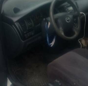 Сірий Мазда МПВ, об'ємом двигуна 2 л та пробігом 306 тис. км за 3100 $, фото 3 на Automoto.ua