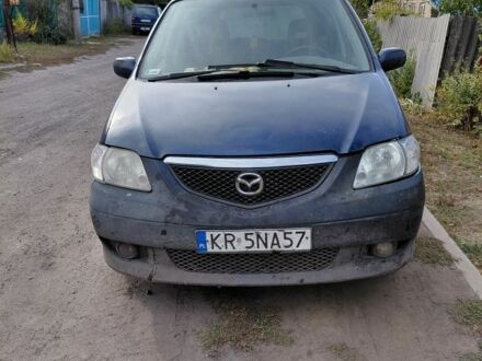 Синій Мазда МПВ, об'ємом двигуна 2 л та пробігом 337 тис. км за 1495 $, фото 1 на Automoto.ua