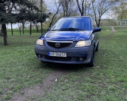 Синий Мазда МПВ, объемом двигателя 2 л и пробегом 336 тыс. км за 1958 $, фото 1 на Automoto.ua