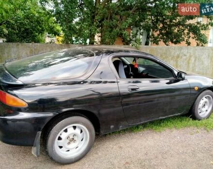 Черный Мазда МХ-3, объемом двигателя 1.8 л и пробегом 280 тыс. км за 2500 $, фото 6 на Automoto.ua