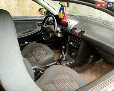 Черный Мазда МХ-3, объемом двигателя 1.8 л и пробегом 280 тыс. км за 2500 $, фото 2 на Automoto.ua