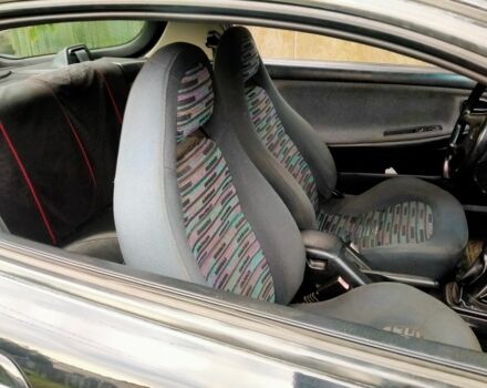 Черный Мазда МХ-3, объемом двигателя 1.8 л и пробегом 280 тыс. км за 2450 $, фото 2 на Automoto.ua