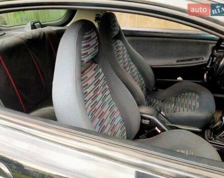 Черный Мазда МХ-3, объемом двигателя 1.8 л и пробегом 280 тыс. км за 2500 $, фото 1 на Automoto.ua