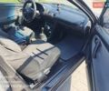 Чорний Мазда МХ-3, об'ємом двигуна 1.6 л та пробігом 196 тис. км за 3000 $, фото 1 на Automoto.ua