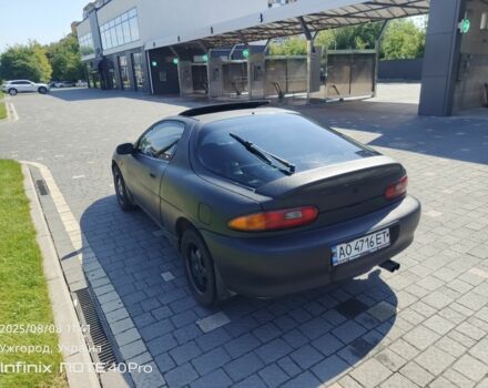 Чорний Мазда МХ-3, об'ємом двигуна 1.8 л та пробігом 196 тис. км за 2800 $, фото 4 на Automoto.ua