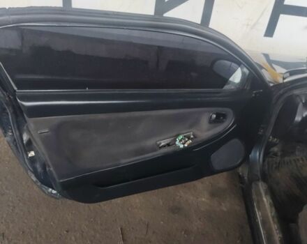 Черный Мазда МХ-3, объемом двигателя 1.6 л и пробегом 320 тыс. км за 593 $, фото 7 на Automoto.ua