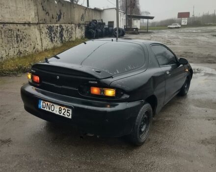 Черный Мазда МХ-3, объемом двигателя 1.6 л и пробегом 320 тыс. км за 593 $, фото 2 на Automoto.ua