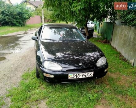 Черный Мазда МХ-3, объемом двигателя 1.8 л и пробегом 280 тыс. км за 2500 $, фото 1 на Automoto.ua