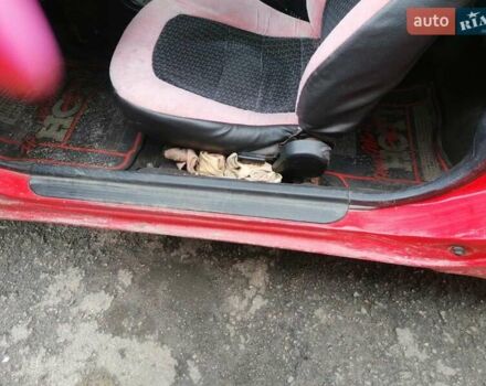 Красный Мазда МХ-3, объемом двигателя 1.8 л и пробегом 294 тыс. км за 2500 $, фото 12 на Automoto.ua