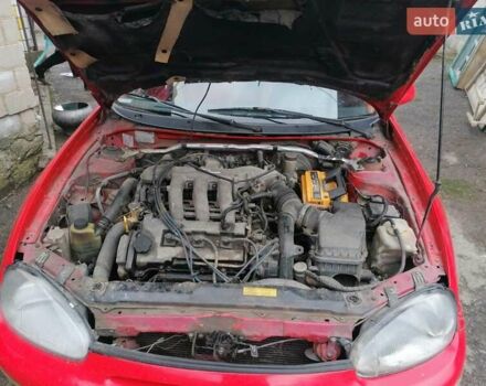Красный Мазда МХ-3, объемом двигателя 1.8 л и пробегом 294 тыс. км за 2500 $, фото 6 на Automoto.ua