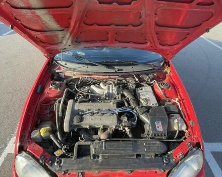 Красный Мазда МХ-3, объемом двигателя 1.6 л и пробегом 257 тыс. км за 1600 $, фото 8 на Automoto.ua