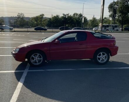 Красный Мазда МХ-3, объемом двигателя 1.6 л и пробегом 257 тыс. км за 1600 $, фото 2 на Automoto.ua