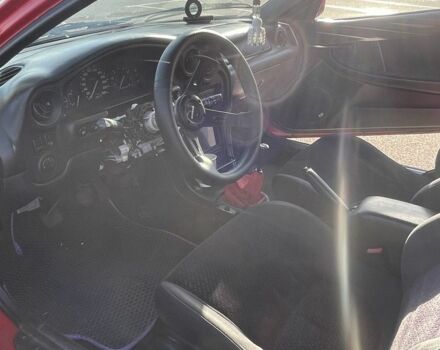 Красный Мазда МХ-3, объемом двигателя 1.6 л и пробегом 257 тыс. км за 1600 $, фото 5 на Automoto.ua