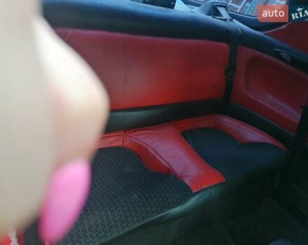 Красный Мазда МХ-3, объемом двигателя 1.8 л и пробегом 294 тыс. км за 2500 $, фото 8 на Automoto.ua