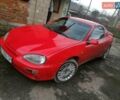 Красный Мазда МХ-3, объемом двигателя 1.8 л и пробегом 294 тыс. км за 2500 $, фото 1 на Automoto.ua