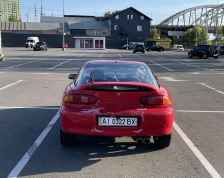 Красный Мазда МХ-3, объемом двигателя 1.6 л и пробегом 257 тыс. км за 1600 $, фото 1 на Automoto.ua