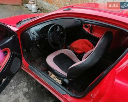 Красный Мазда МХ-3, объемом двигателя 1.8 л и пробегом 294 тыс. км за 2500 $, фото 5 на Automoto.ua