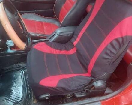 Красный Мазда МХ-3, объемом двигателя 1.6 л и пробегом 250 тыс. км за 1300 $, фото 7 на Automoto.ua