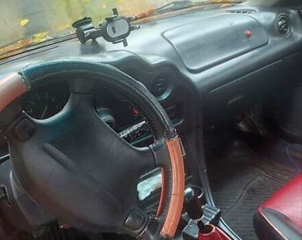 Красный Мазда МХ-3, объемом двигателя 1.6 л и пробегом 250 тыс. км за 1300 $, фото 8 на Automoto.ua