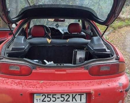 Красный Мазда МХ-3, объемом двигателя 1.6 л и пробегом 250 тыс. км за 1300 $, фото 5 на Automoto.ua