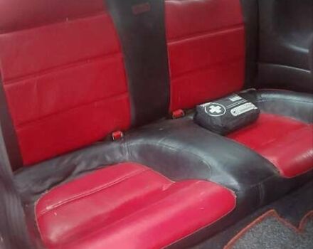 Красный Мазда МХ-3, объемом двигателя 1.6 л и пробегом 250 тыс. км за 1300 $, фото 6 на Automoto.ua