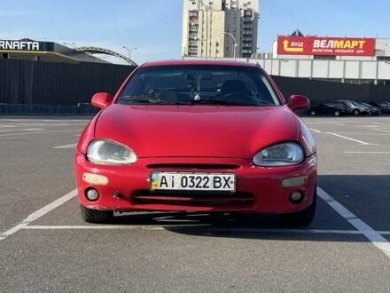 Красный Мазда МХ-3, объемом двигателя 1.6 л и пробегом 257 тыс. км за 1600 $, фото 1 на Automoto.ua