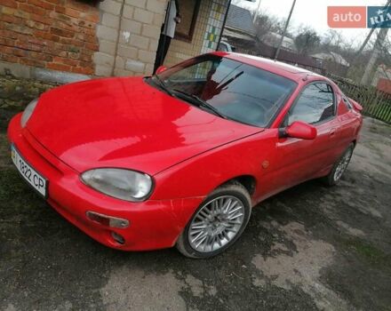 Красный Мазда МХ-3, объемом двигателя 1.8 л и пробегом 294 тыс. км за 2500 $, фото 1 на Automoto.ua